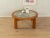 Classic coffee table from the 1970s. High-quality solid oak frame with a marble tabletop in cream and gray tones. Quality...