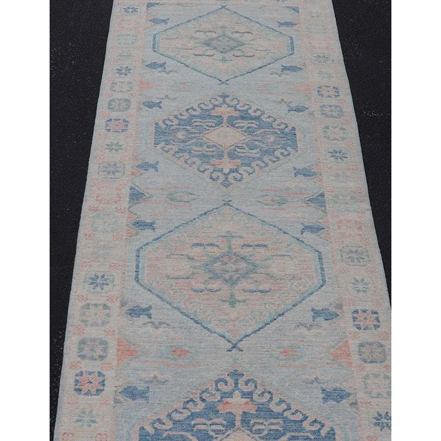 Measures: 2'10 x 9'10 Modern Oushak Medallion Design Runner With Light Blue Color With Muted Colors. Keivan Woven Arts;...