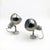 A matching pair of unused Space Age wall lamps from the 1970s, characterized by polished chrome-finished metal shades and...