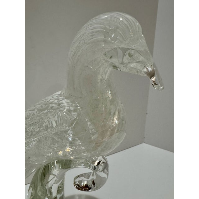 Decorative clear art-glass sculpture featuring two highly detailed birds in a vertically arranged composition. Unmarked,...