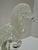 Decorative clear art-glass sculpture featuring two highly detailed birds in a vertically arranged composition. Unmarked,...