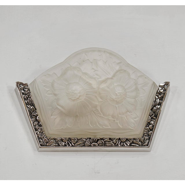 Verdun A pair of French art deco wall sconces in nickel plated solid brass or bronze made c. 1928-1935. The nice mounts...