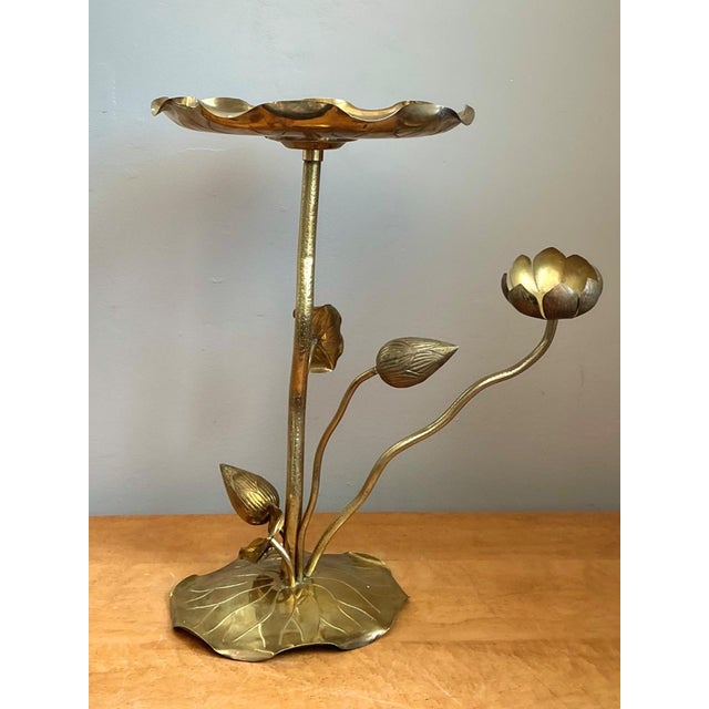Designed by the iconic Carole Stupell, this vintage brass accent table is a masterclass in Hollywood Regency glamour and...