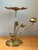 Designed by the iconic Carole Stupell, this vintage brass accent table is a masterclass in Hollywood Regency glamour and...