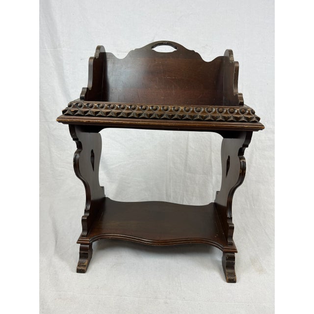 Beautiful and unique mahogany book/magazine stands. This early-to-mid 20th century piece was made in a traditional or...