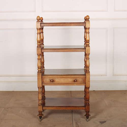 Early 19th century English bleached mahogany four tier whatnot on castors. 1840. This piece is designed in the style of...