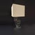 Single Geometric Modernist table lamp. Overlapping squares and rectangles in chrome and brass. Dimensions: H:33 W:11.75...