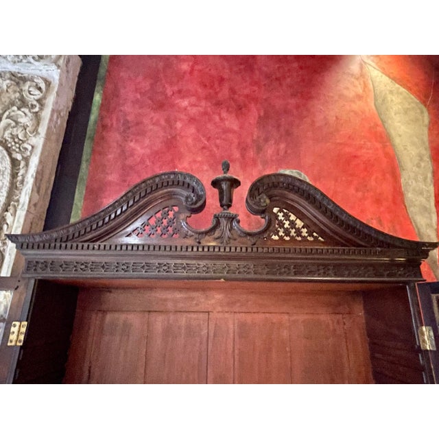 George III period mahogany Chinese Chippendale secretary bookcase, England, circa 1790. The original ogee bracket feet and...