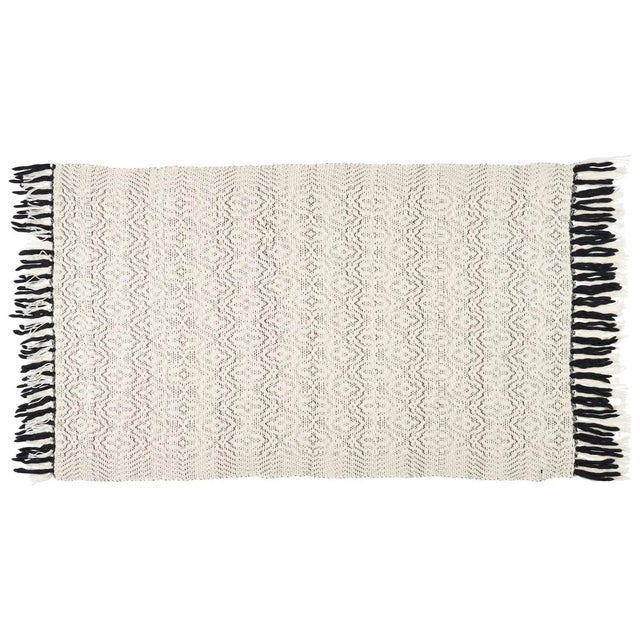 The Overshot Throw by Shed Textile Company is handwoven with 100% Merino wool and finished with fringe. This throw has the...