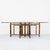 Monumental bamboo and laced rawhide pedestal base dining table by McGuire from the 1980s. The beveled glass top measures...