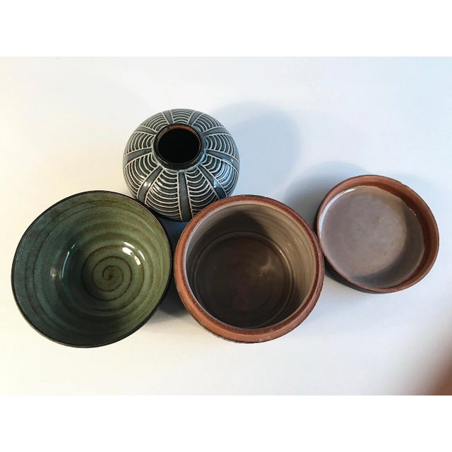 This nice set of three studio ceramic vessels was created by Eva Kumpmann (born 1920) in Göttingen, Germany during the...
