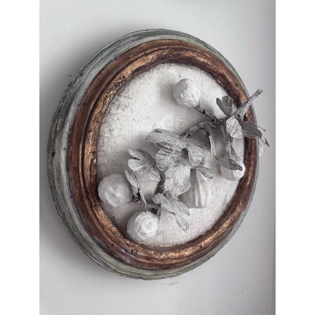“Aurelia” Paper Mache and Plaster Fig Branch in Cartapesta Round Frame. Add elegance and texture to your space with this...
