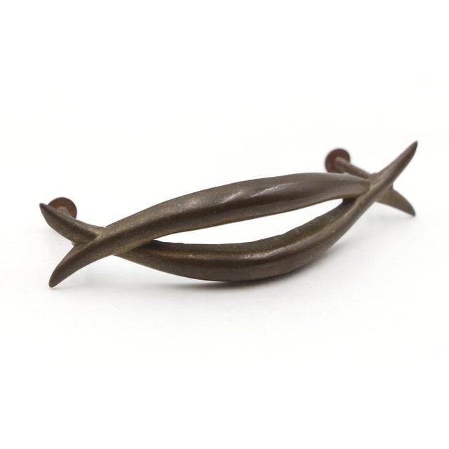 Pair of Mid Century drawer pulls made of brass in a dark antique brass finish. Mounting screws are included. Good...