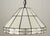 Vintage Arts & Crafts stained glass pendant light. The glass is cream with some tan marbling; there is geometric detailing...