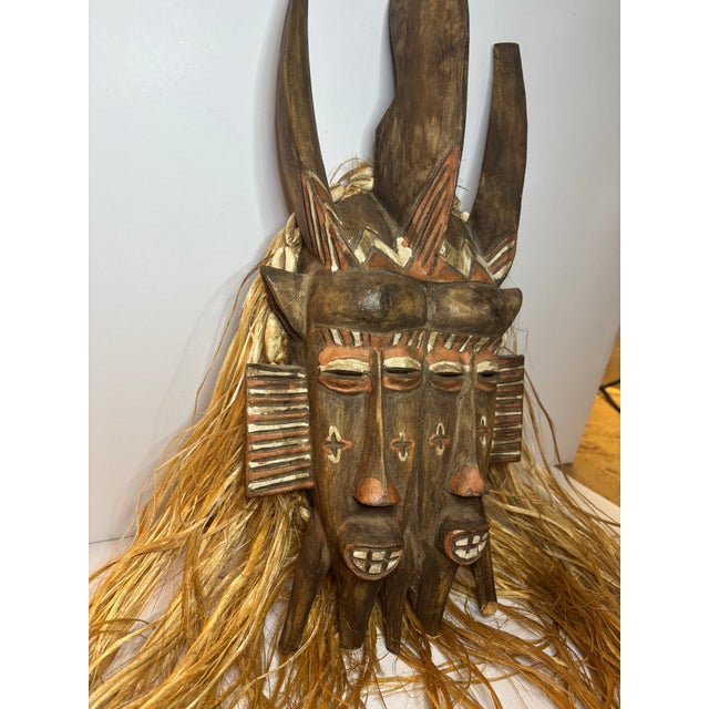 African Late 19th Century West African Double-Faced Carved Wood Mask With Raffia and Cowrie Shells For Sale - Image 3 of 11