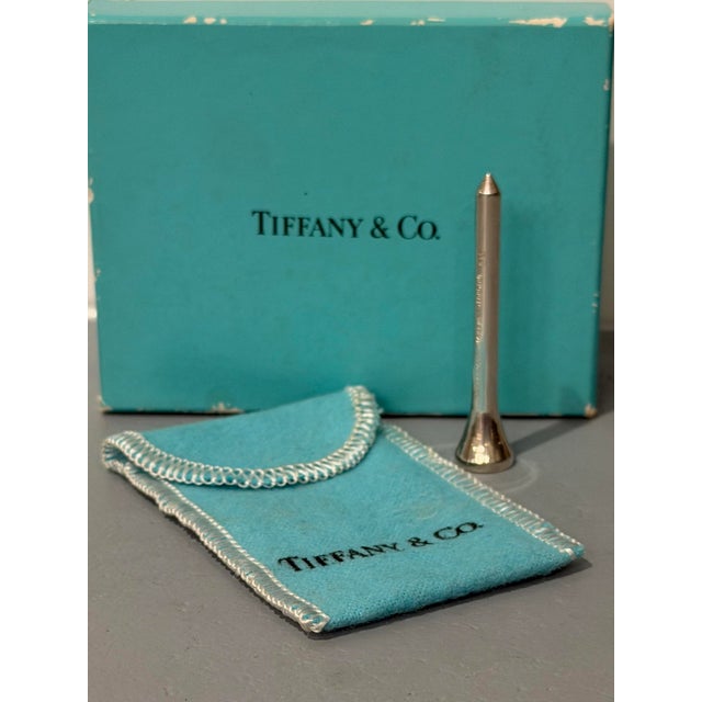 1990's Tiffany & Co .925 sterling silver golf tee hallmarked with logo and presented in its original blue felt "sleeper"...