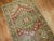 A Decorative Persian Heriz one of a kind antique runner from the early 20th century with rustic colors Measures: 3' x 10'9".