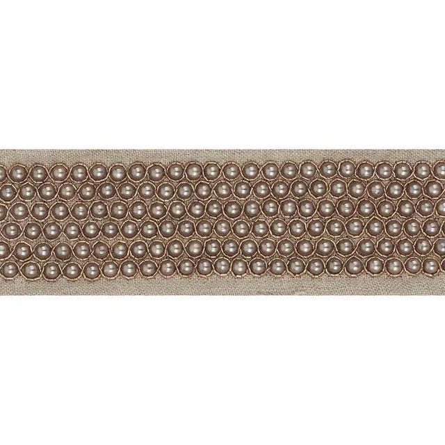 With pearl-like beading accented by hand-stitched metallic thread this tape delivers a sumptuously polished finishing...