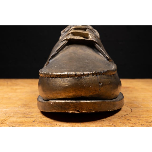 Mid-20th-century oversized shoe store display form modeled as a men's lace-up oxford with a rounded toe, stacked heel,...