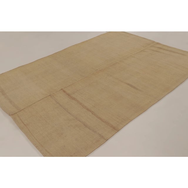 Handwoven in wool, this 6x8 contemporary kilim is a sophisticated addition to Rug & Kilim’s curation. This brand-new piece...