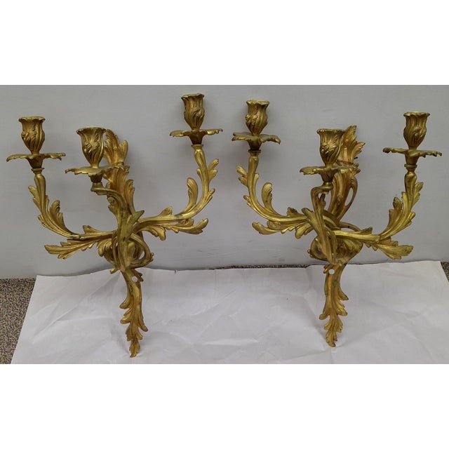 A pair of late 19th century Pair of Rococo Style Gilt Bronze Three Arm Wall Candelabra Sconces. Not electrical....