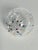 Unique collectible blown glass Christmas ornament ball with multicolor spikes inside.