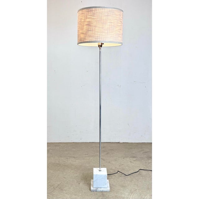 A classic modernist design floor lamp in the style of Sonneman or Kovaks (possibly Italian) with Carrara marble base and...