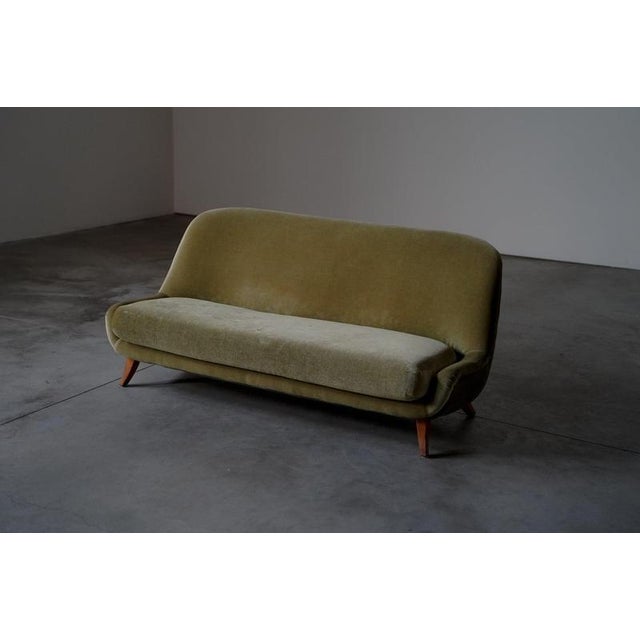 Sofa The sofa is in a good condition with traces of usage normal to it’s age. This item can be reupholstered on request.