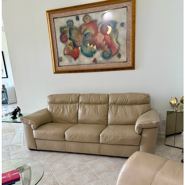 This stunning leather sofa is pre-owned but has had very little wear. Made by Italian maker of fine furniture, Natuzzi,...
