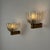 A rare and refined pair of Murano wall sconces by Barovier & Toso, designed by Ercole Barovier, Italy, 1940s. Each sconce...