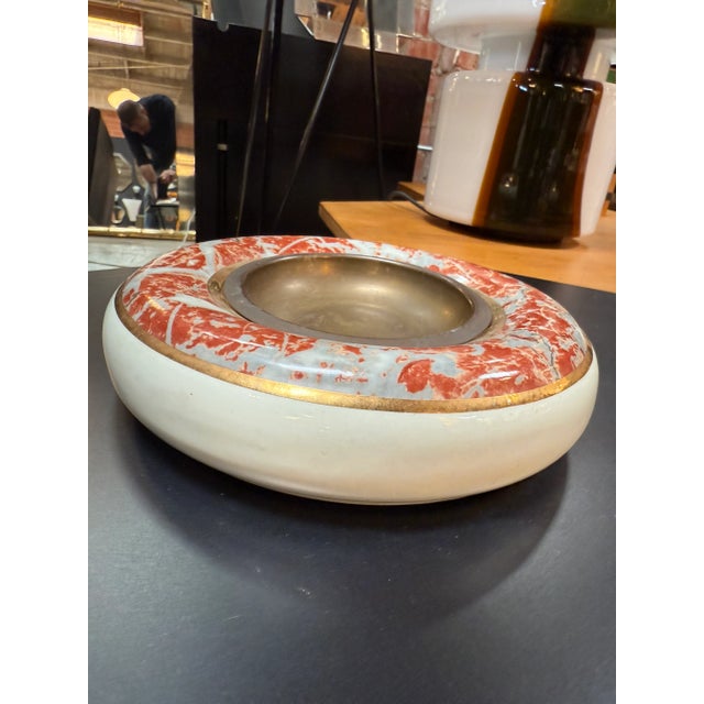 This striking centerpiece bowl by Tomaso Barbi exemplifies the Italian designer’s refined approach to decorative arts in...