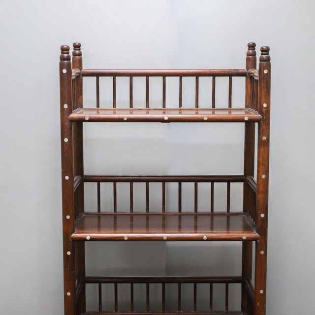 This is a vintage wooden display cabinet or bookshelf, crafted from rosewood (Huali wood) with intricate mother-of-pearl...