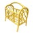 Vintage rattan magazine rack finished in a cheerful lacquered yellow, bringing a playful yet sophisticated touch to any...