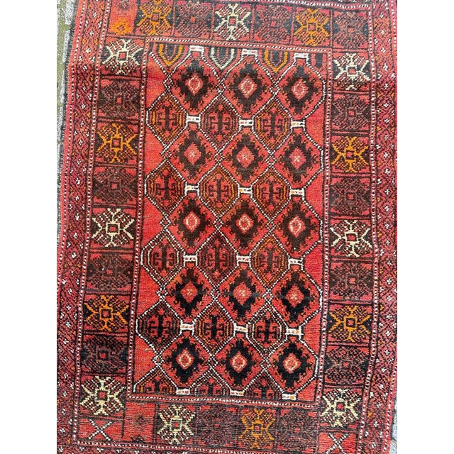 Nice mid century Baluch Afghan rug with beautiful tribal and stylized designs and nice natural colours, entirely hand...