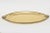 This lovely vintage brass oval tray has 2 shell designs at either end. There is a braided perimeter brass design surround....