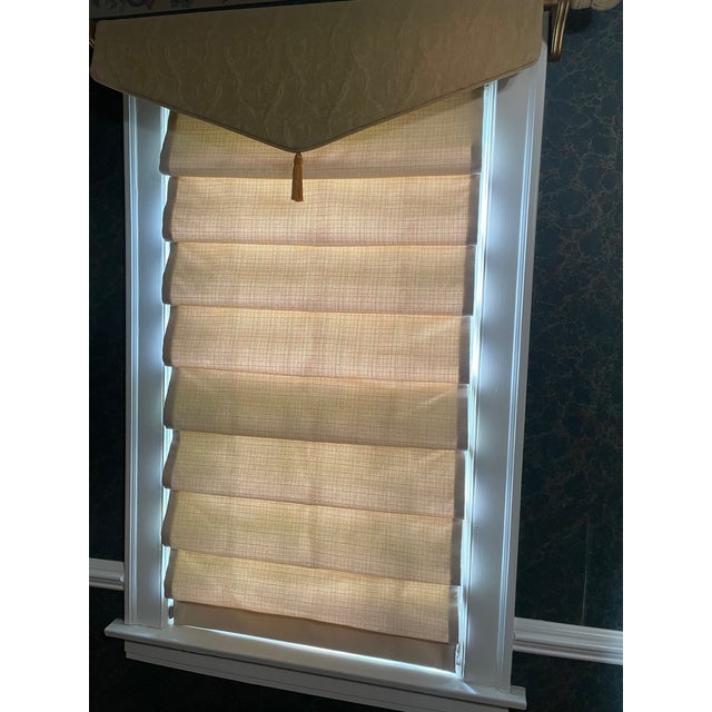 Brand new pair (2) custom Fabricut Roman Shades in Putty Color Fabric With White Lining. We ordered too many, they are...