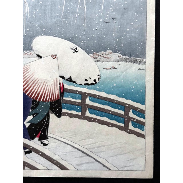 On offer is a Japanese woodblock print entitled "Snow on Willow Bridge" by Ohar Shoson (1877-1945). widely considered as...
