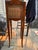 Elegant Theodore Alexander three-drawer side table featuring a rich dark walnut finish, graceful tapered legs, and...