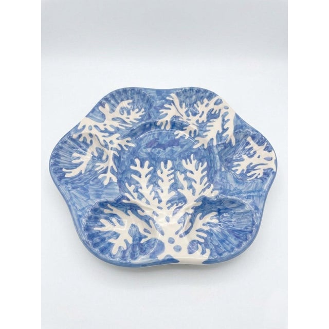 This exquisite pair of ceramic oyster plates represents the height of coastal-inspired Italian luxury. Produced by the...