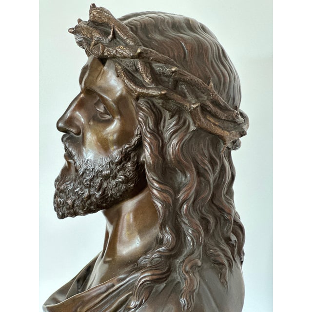 Patinated bronze sculpture, Ecce Homo, signed in cast Jean R. Bulio, dated 1874, on an integral socle This piece has an...