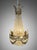 Beautiful French Sac de Pearl chandelier, 20th century, designed in the Empire style with a cast brass basket frame richly...