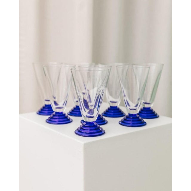 8 Italian vintage glasses made of press glass with a beautiful structure. The glasses can act as wine, water or champagne...