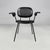 Italian mid-century modern black faux leather and black metal armchair, 1960s Armchair or chair with armrests padded and...