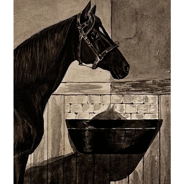 A finely executed antique equestrian study depicting a sleek thoroughbred standing in profile within a stable interior....