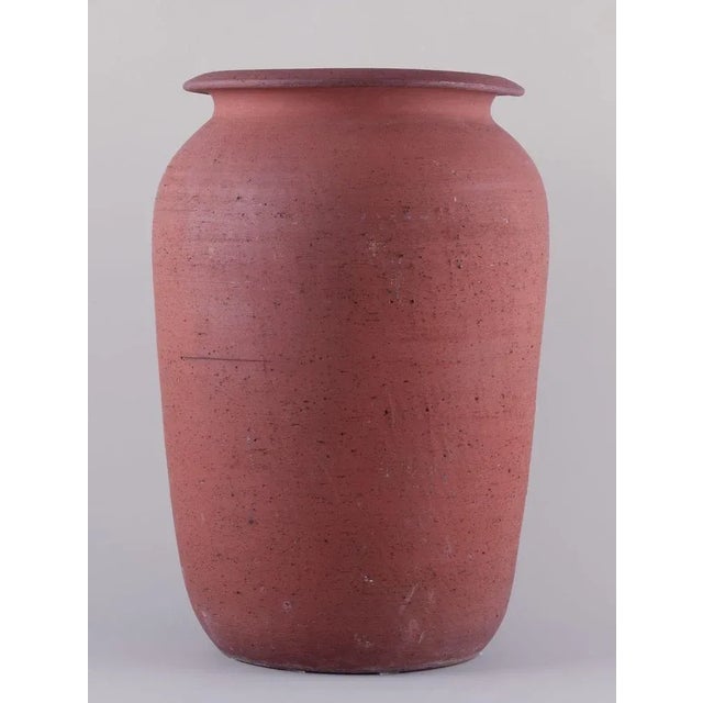 Kähler, large floor vase of unglazed red clay. Mid -0th century. Signed HAK, Denmark. In excellent condition with minor...