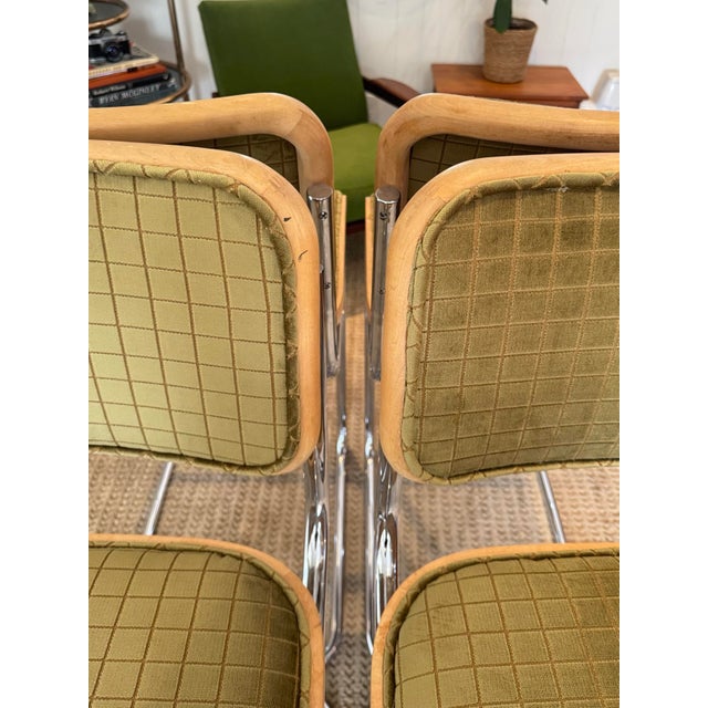 A classic set of 4 Cesca style barstools in the style of Marcel Breuer, circa 1970s–80s. Recently reupholstered in a...