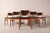 Set of six teak dining chairs, made in Denmark in the 1960s. Teak wood with a satin shellac finish. Black upholstery...