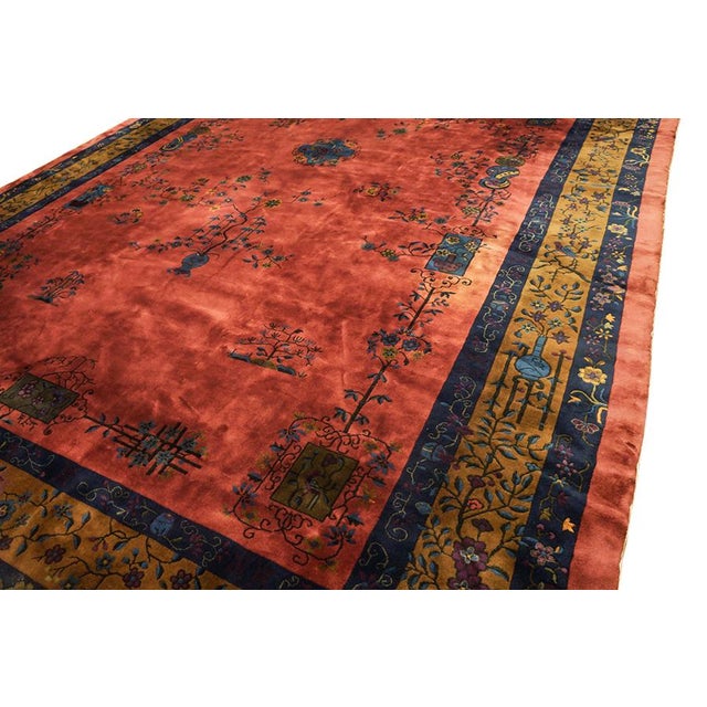 Antique Large Wool Red Hand Knotted Pile Rug, Circa Date: 1920s. This magnificent example of early 20th-century weaving...