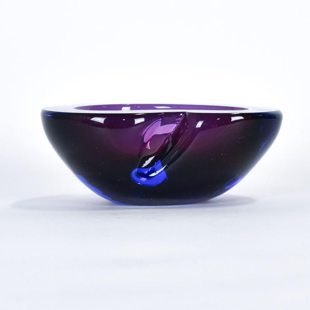 This purple & blue Murano style bowl is from Italy. It is unmarked but was imported from Italy and has been documented...