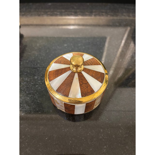 Offered is a precious trinket box made of real brass and mother of pearl. This petite accent trinket box adds instant...